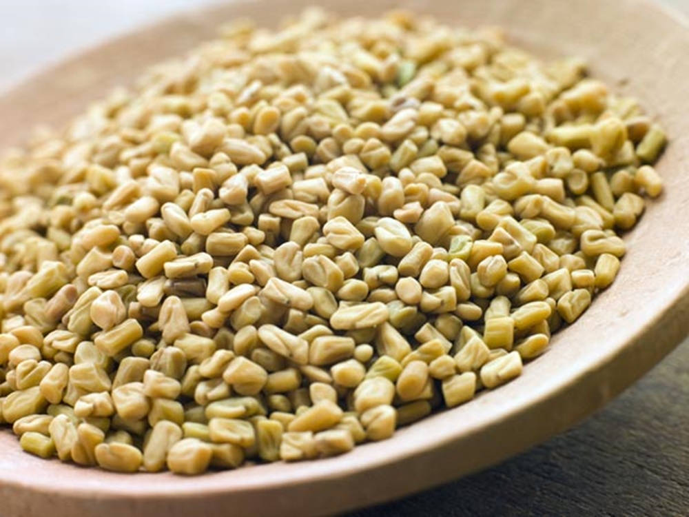 Wooden Plate Filled With Fenugreek Wallpaper