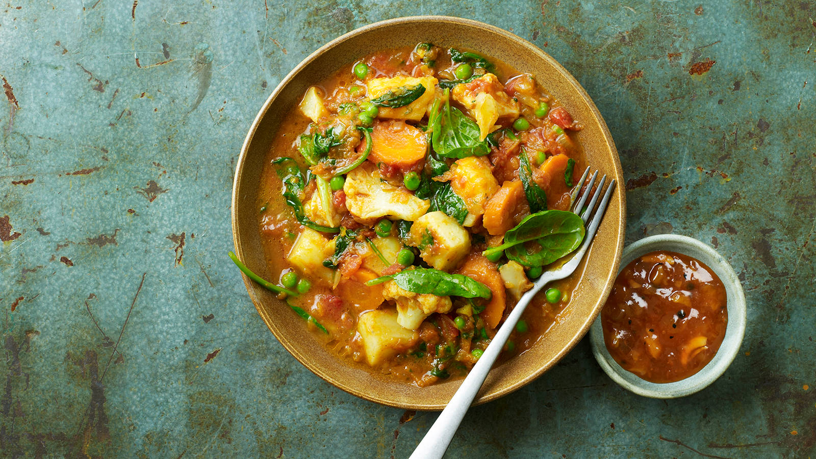 Yellow Curry With Herbs And Creamy Sauce Wallpaper