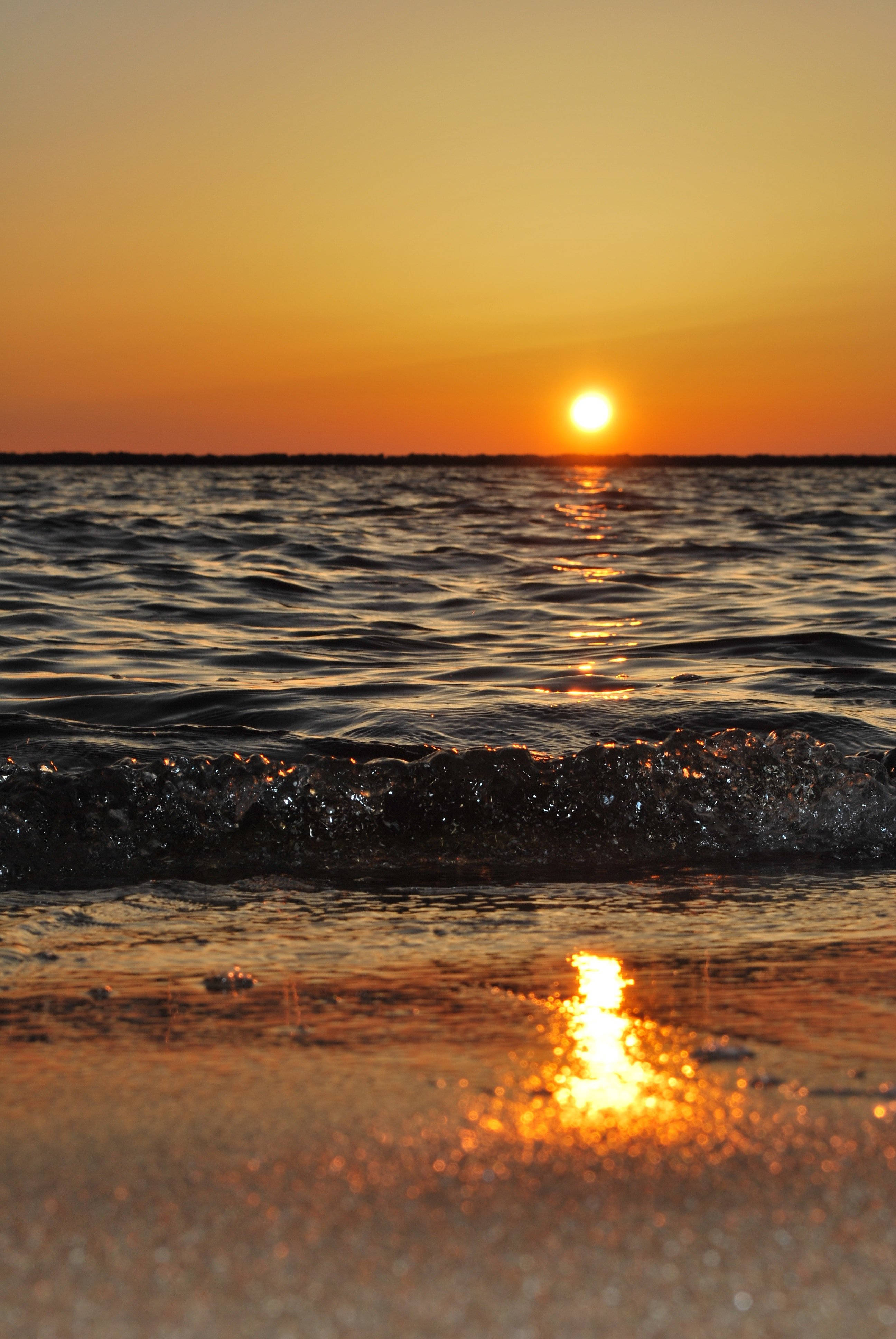 Yellow Sunset Over Beach Android Wallpaper