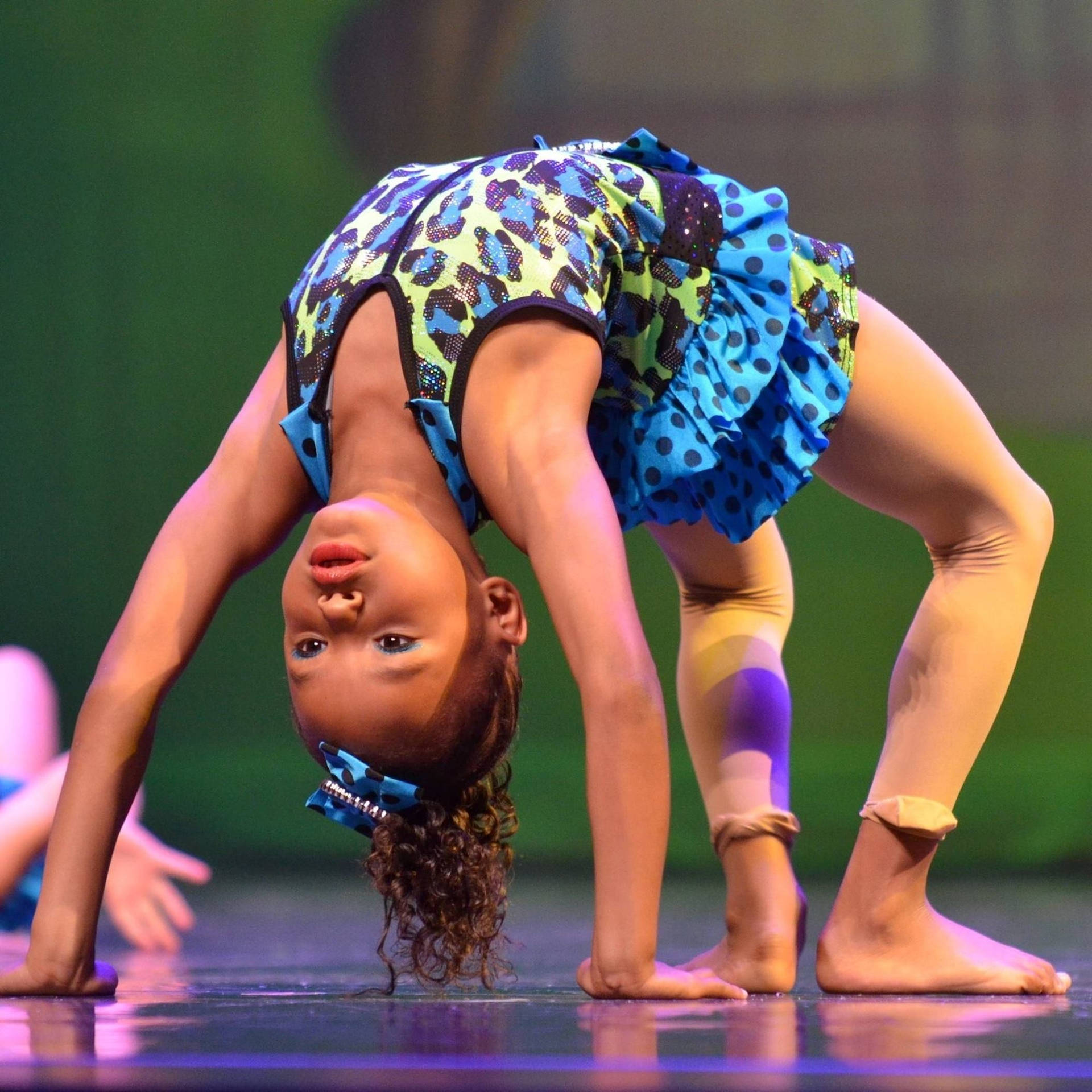 Young Athlete Demonstrates Pliability Wallpaper