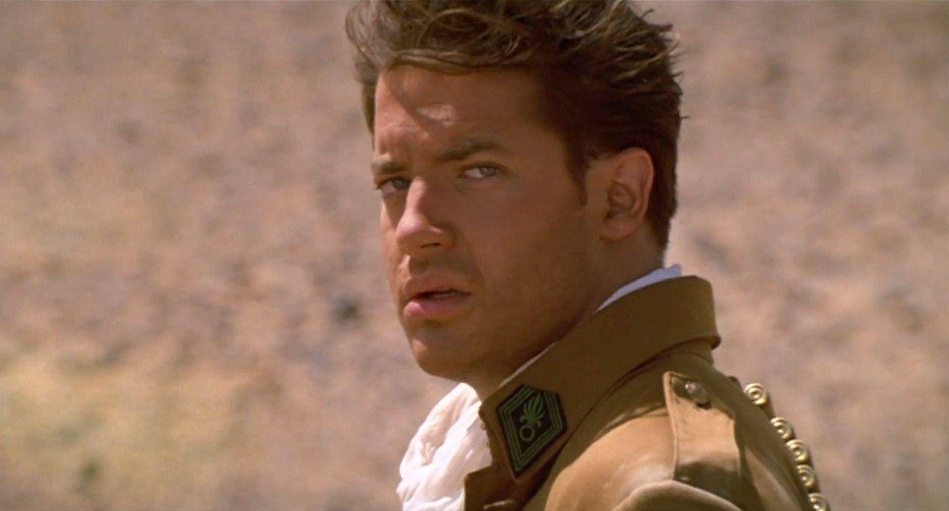 Young Brendan Fraser Action Film Wallpaper