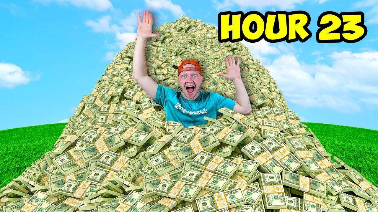 Youtuber Unspeakable In Pile Of Money Wallpaper