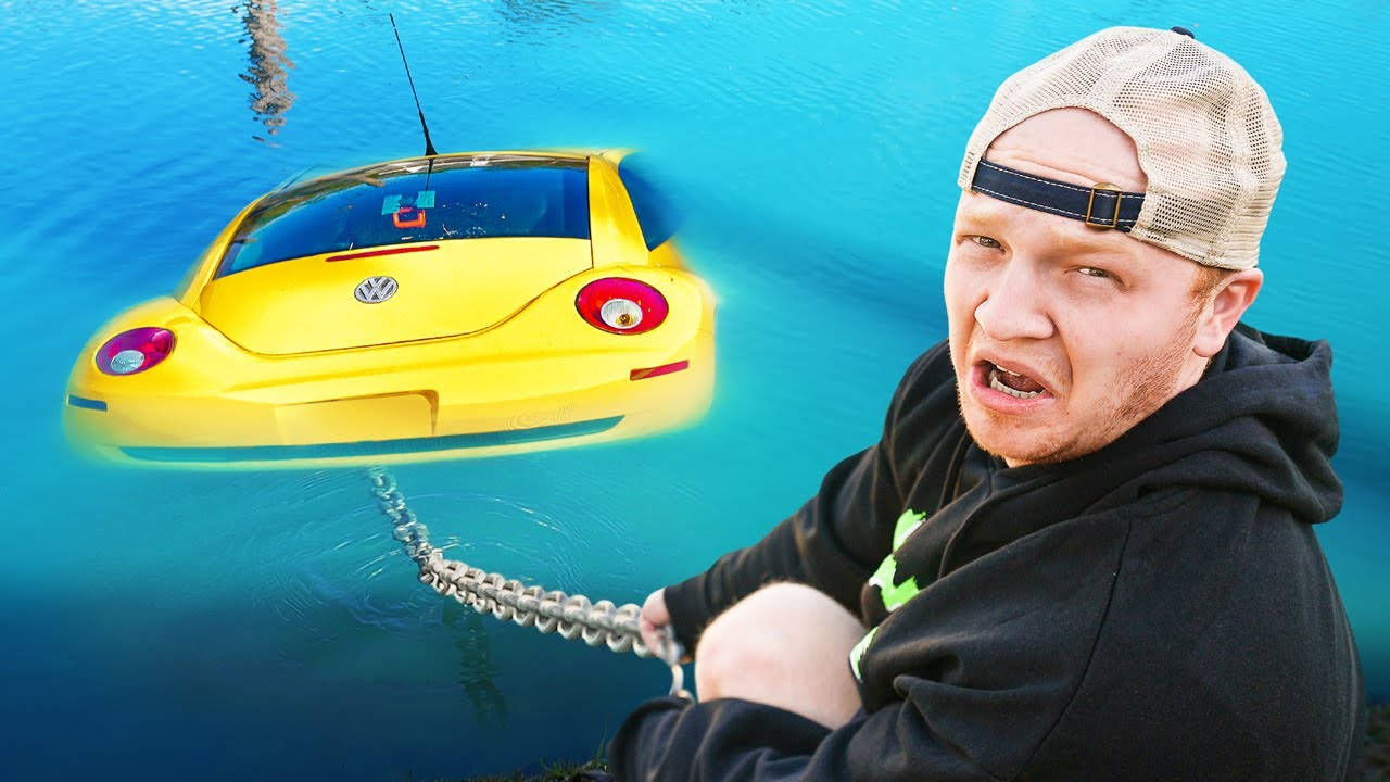 Youtuber Unspeakable Pulling Car From Water Wallpaper