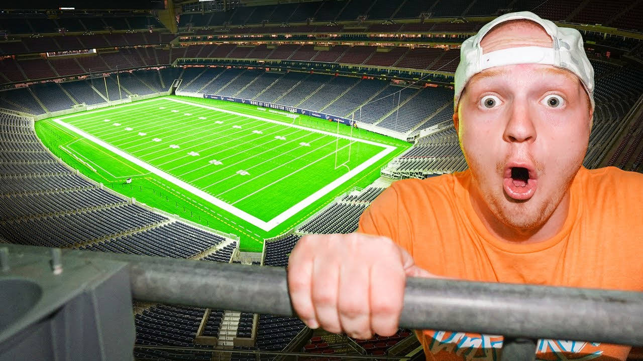 Youtuber Unspeakable With Football Stadium Wallpaper