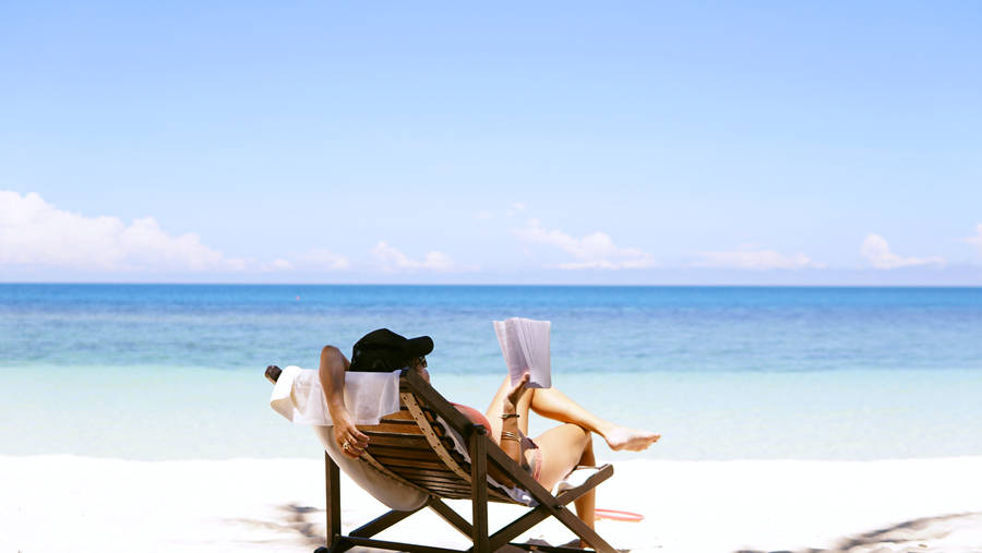 1920x1080 Hd Beach Desktop Relaxing On Deck Chair Wallpaper