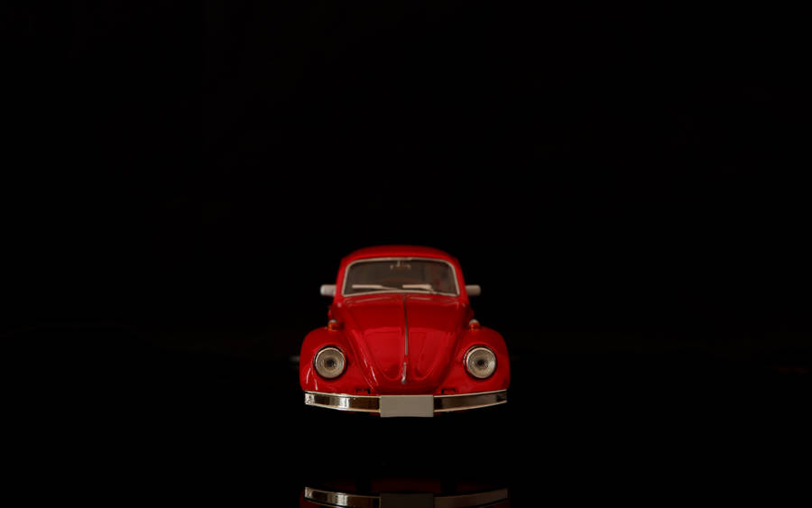 4k Vintage Red Car On Black Wallpaper