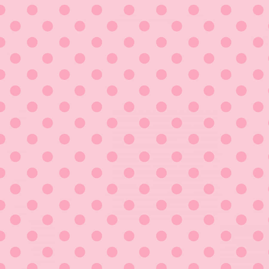 A Background Of Classic Pink And White Polka Dot Pattern Wallpaper