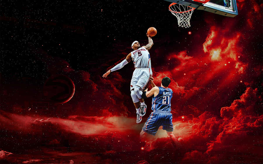 A Basketball Player Is Dunking A Ball Wallpaper