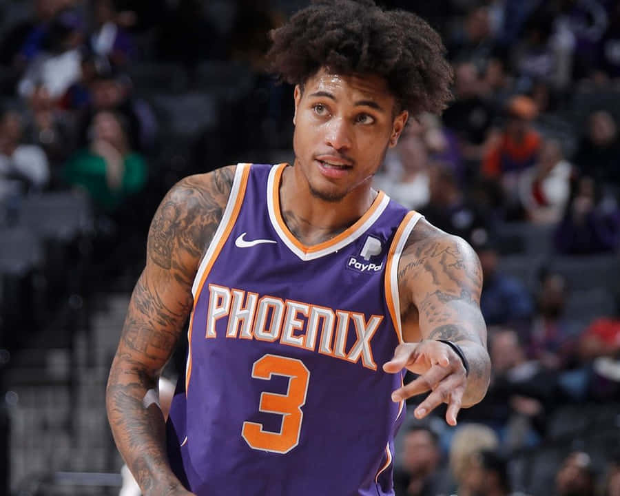 A Basketball Player With Dreadlocks Is Holding A Ball Wallpaper