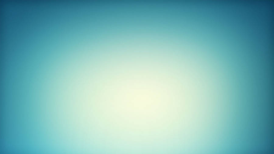 A Beautiful Gradient Of Blue Hues Fading Seamlessly Into One Another Wallpaper