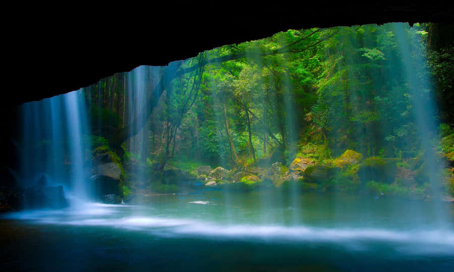 A Beautiful Scene Of A Lake Reflecting The Morning Light Wallpaper