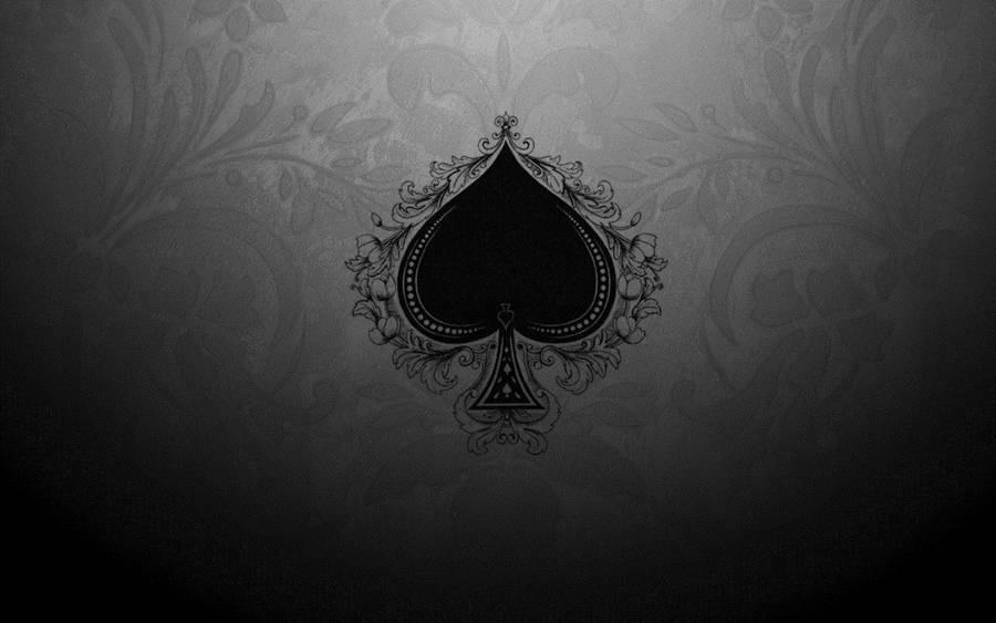 A Black And White Image Of A Spade On A Black Background Wallpaper