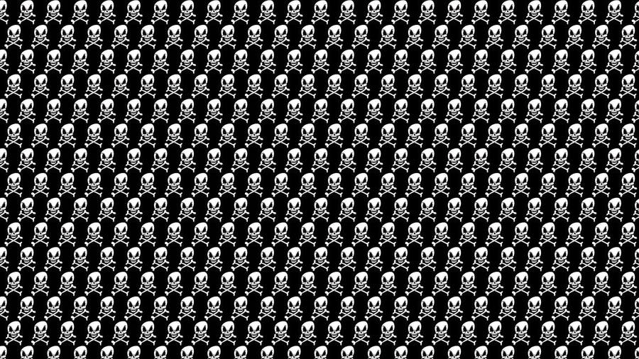 A Black And White Pattern With Skulls On It Wallpaper