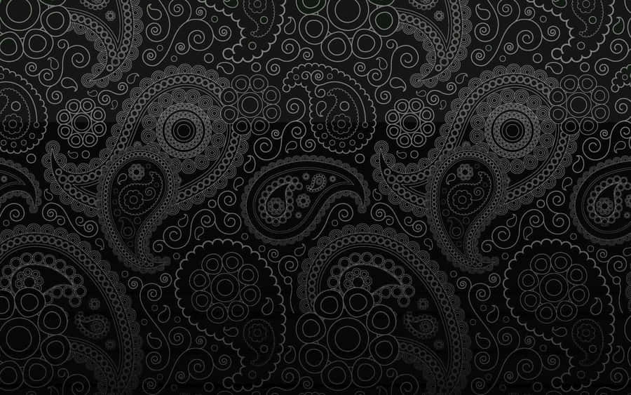 A Black Paisley Wallpaper With A Lot Of Swirls Wallpaper