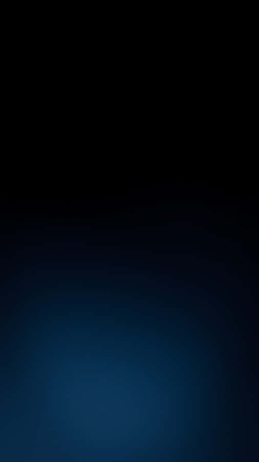 A Blue Background With A Light Shining On It Wallpaper