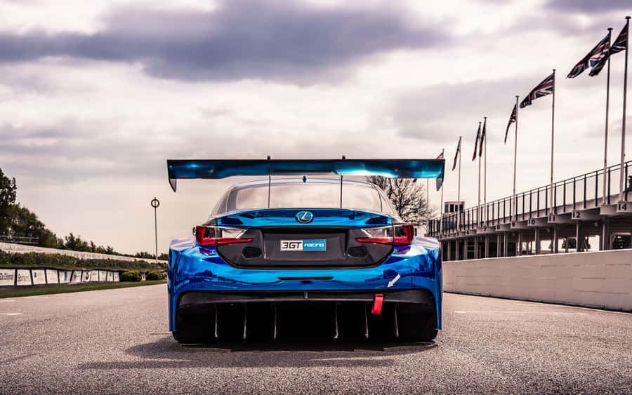 A Blue Car With A Flag On The Back Wallpaper