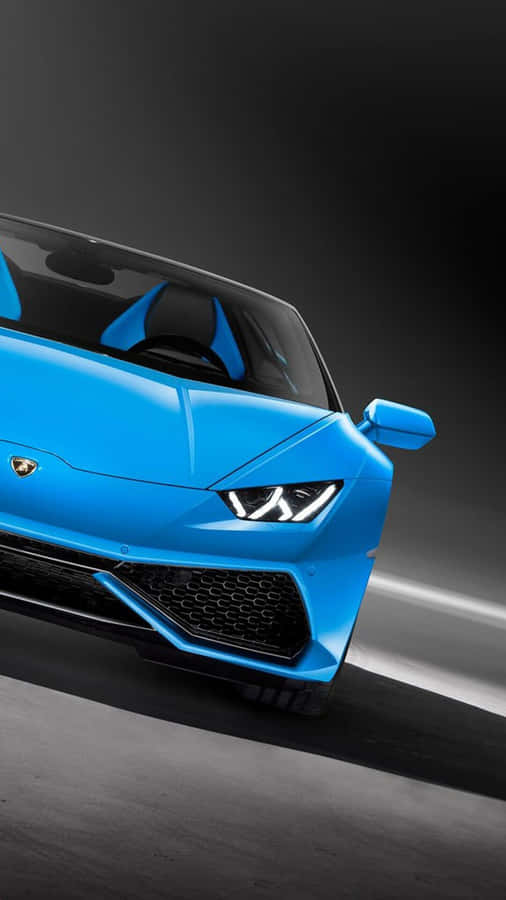A Blue Lamborghini Decorated With An Iphone Wallpaper