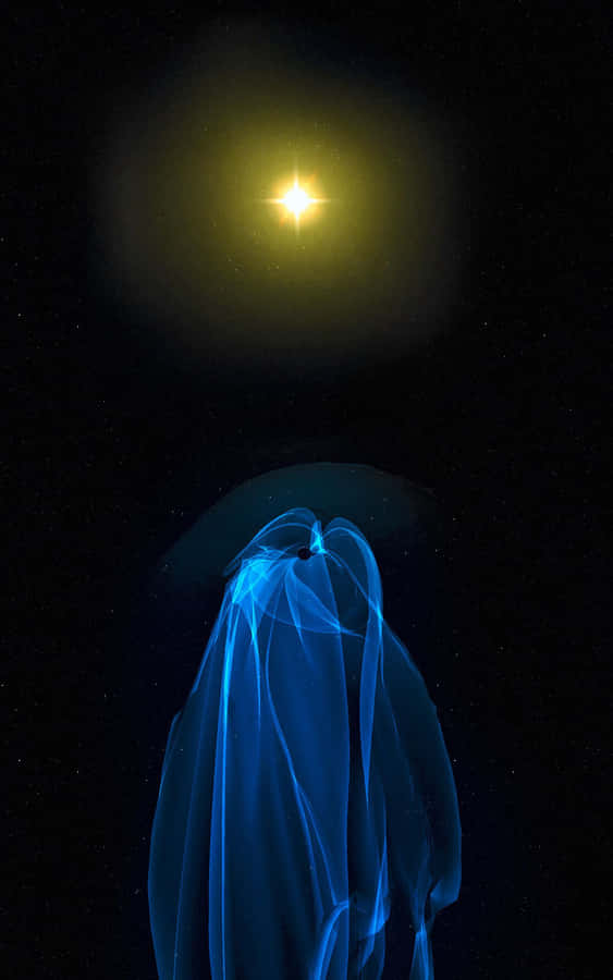 A Blue Light Is Shining In The Sky Wallpaper