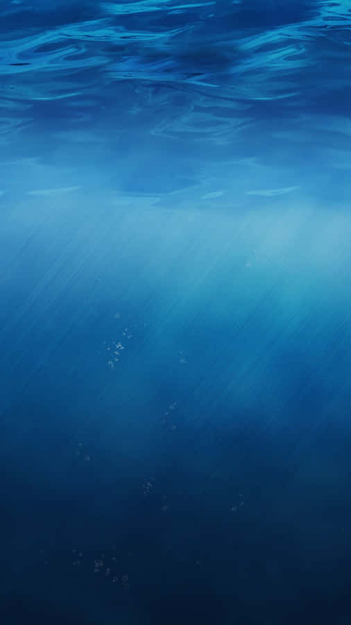 A Blue Ocean With A Lot Of Water Wallpaper