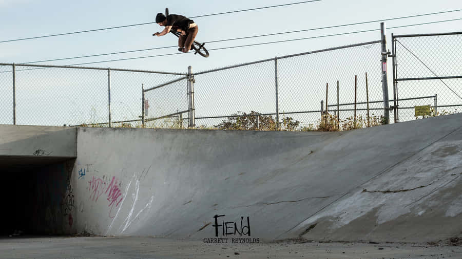 A Bmx Rider Getting Ready For A Big Ride Wallpaper