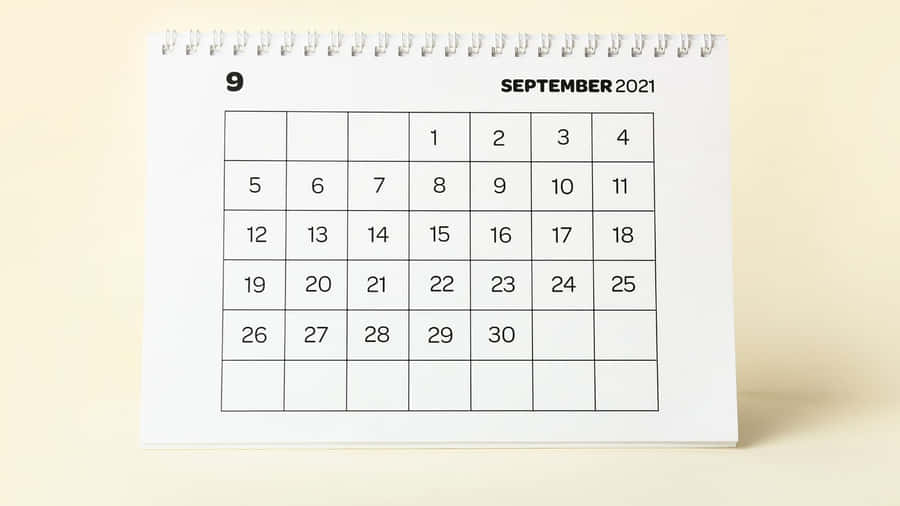 A Calendar With The Number 9 On It Wallpaper