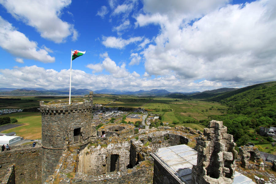 A Castle With A Flag Wallpaper