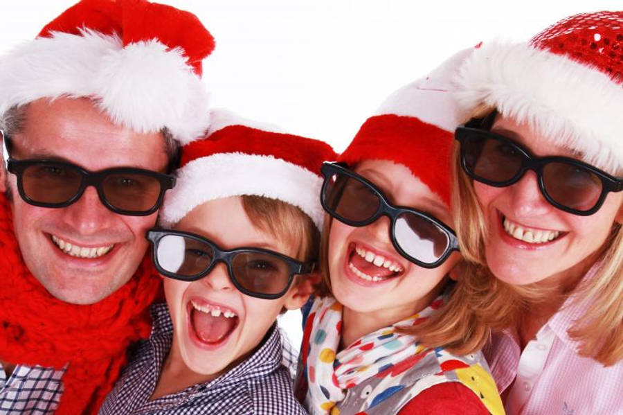 A Cheerful Santa Claus Getting Stuck In A Chimney Wallpaper