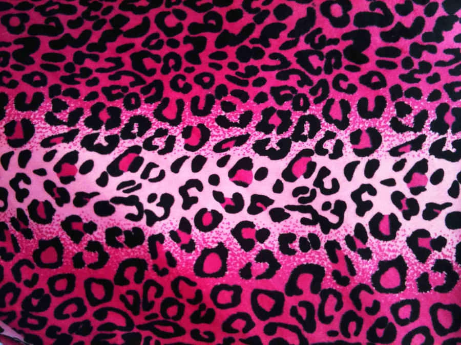 A Close Up Of A Pink Leopard Print Fabric Wallpaper