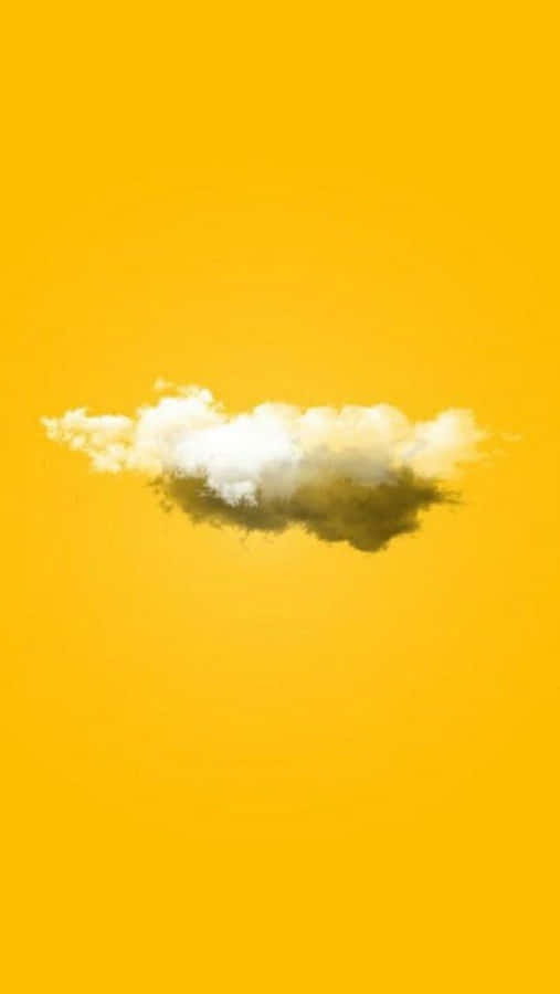 A Cloud In The Sky On A Yellow Background Wallpaper