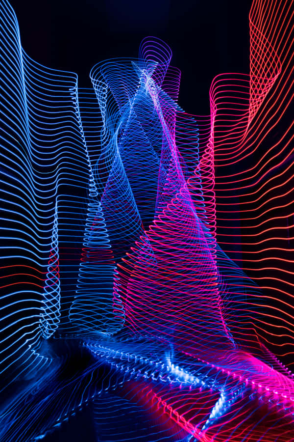 A Colorful Light Art Image With A Dark Background Wallpaper