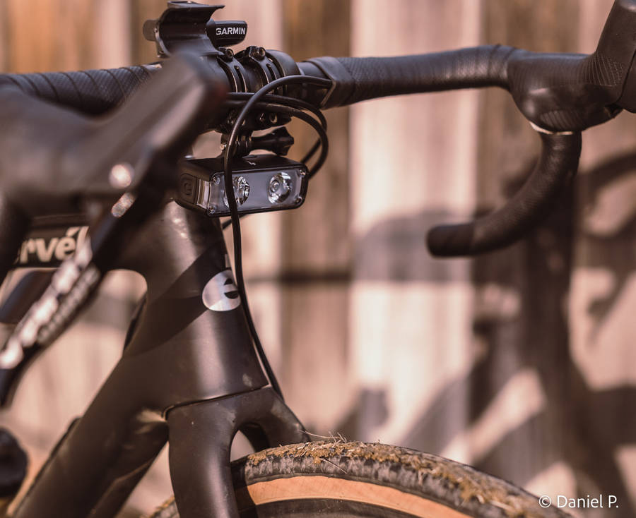 A Cyclist Riding A Specialized Bike Through A Scenic Forest Trail Wallpaper