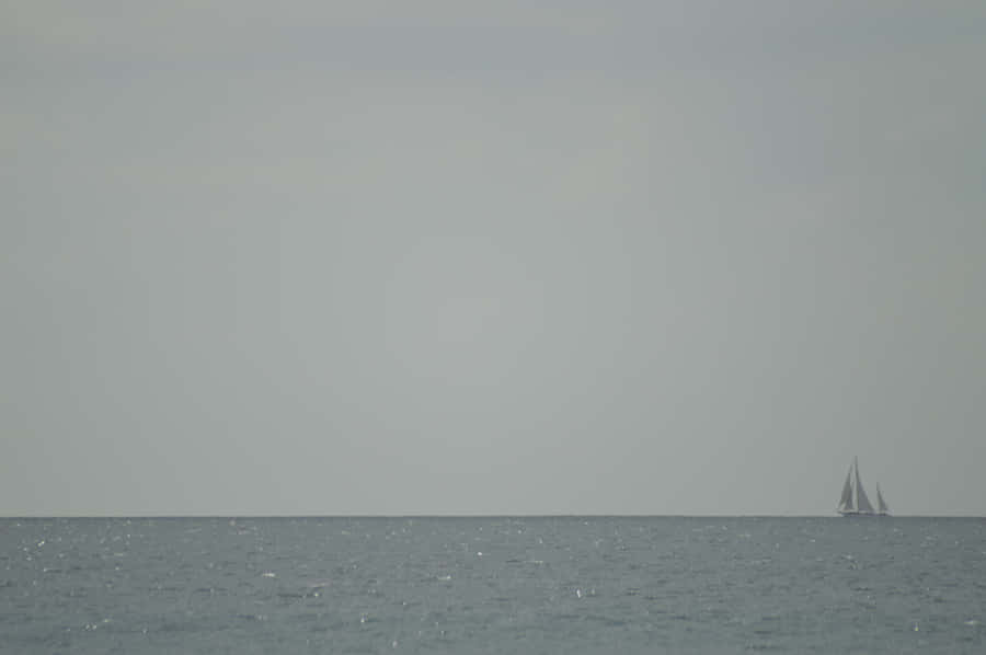 A Dark, Gloomy Night Sky Blights The Cityscape Wallpaper