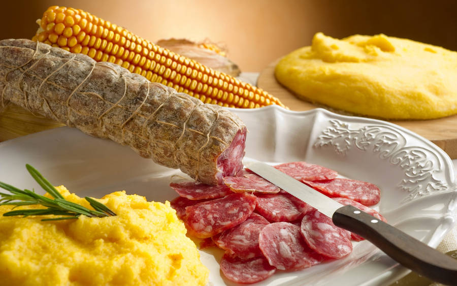 A Delectable Dish Of Salami And Polenta Wallpaper