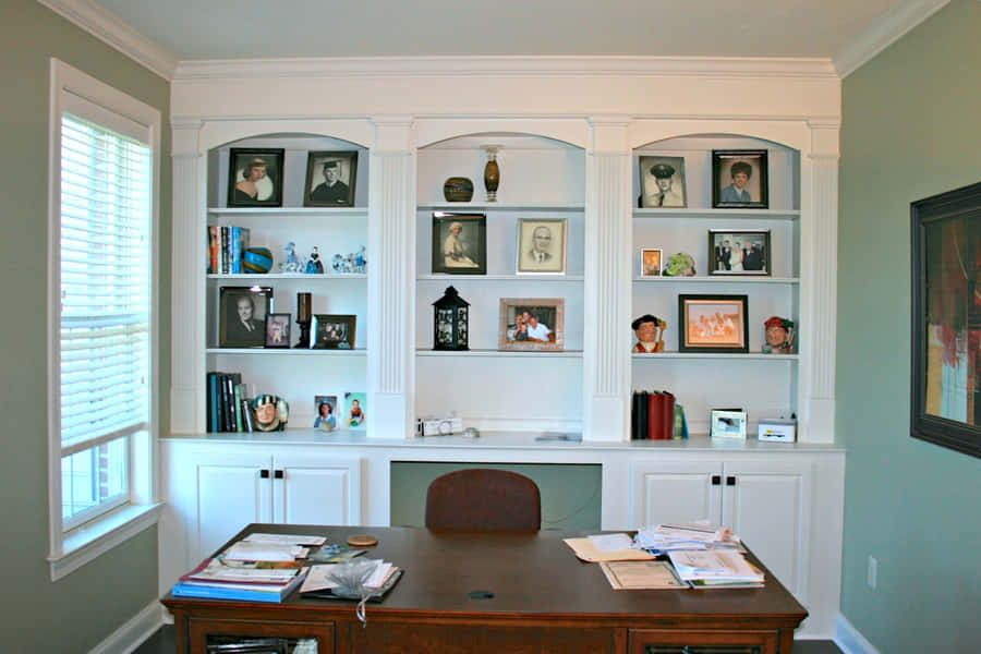 A Desk With A Picture On It Wallpaper