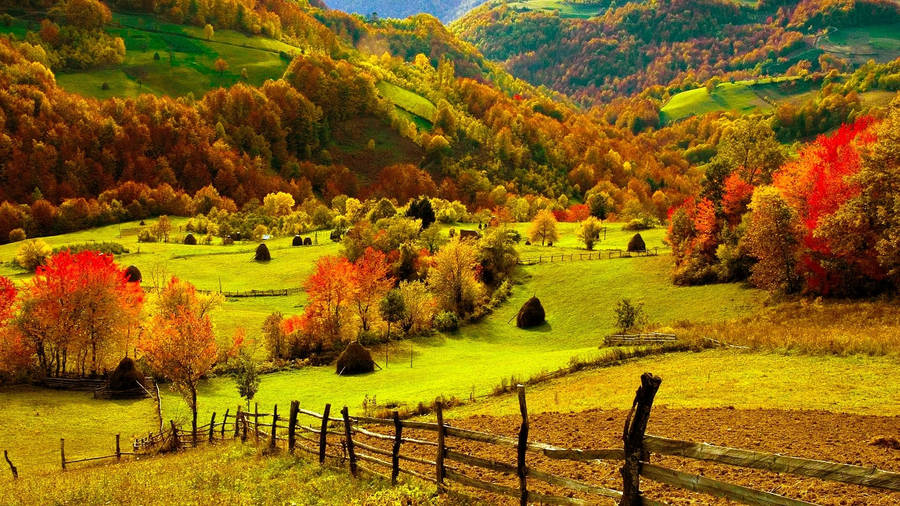 A Desktop View Of A Lush, Green Farm Wallpaper