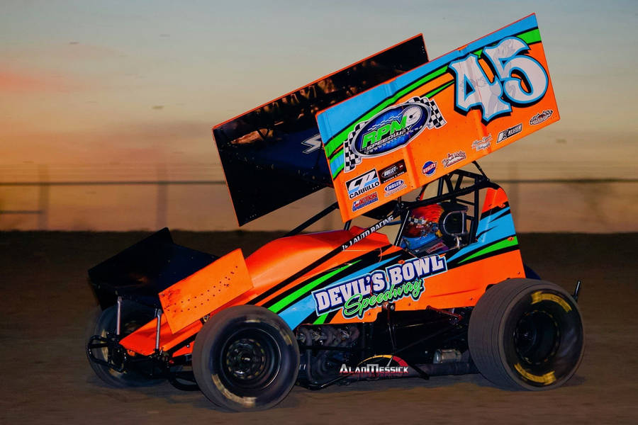 A Dirt Race Car With A Number On It Wallpaper