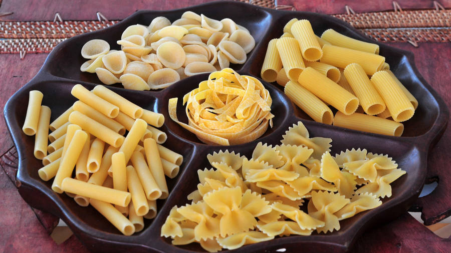 A Diverse Display Of Pasta Varieties Wallpaper