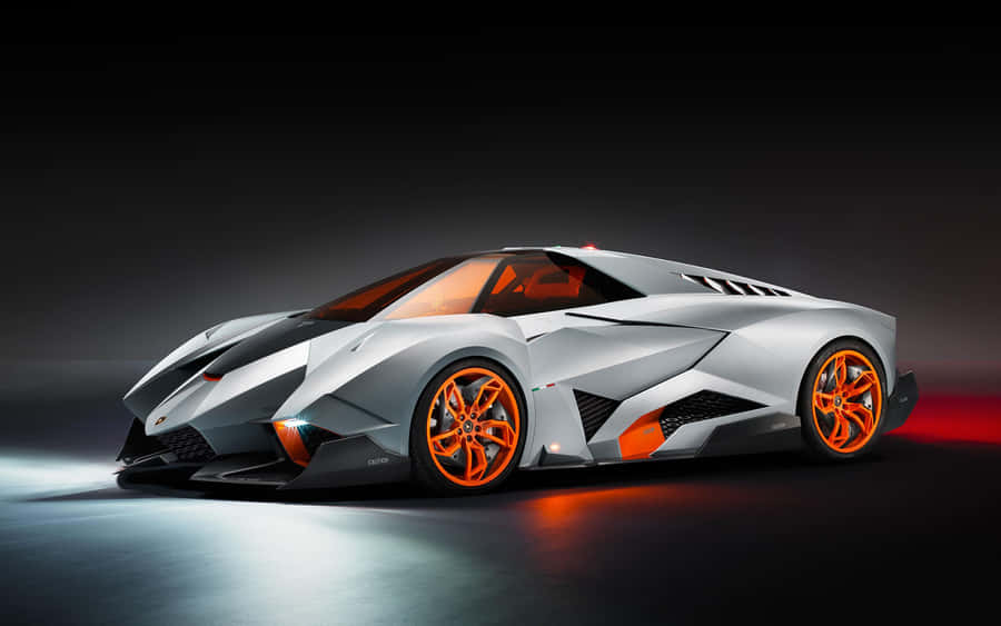 A Futuristic Car With Orange Wheels And A White Interior Wallpaper