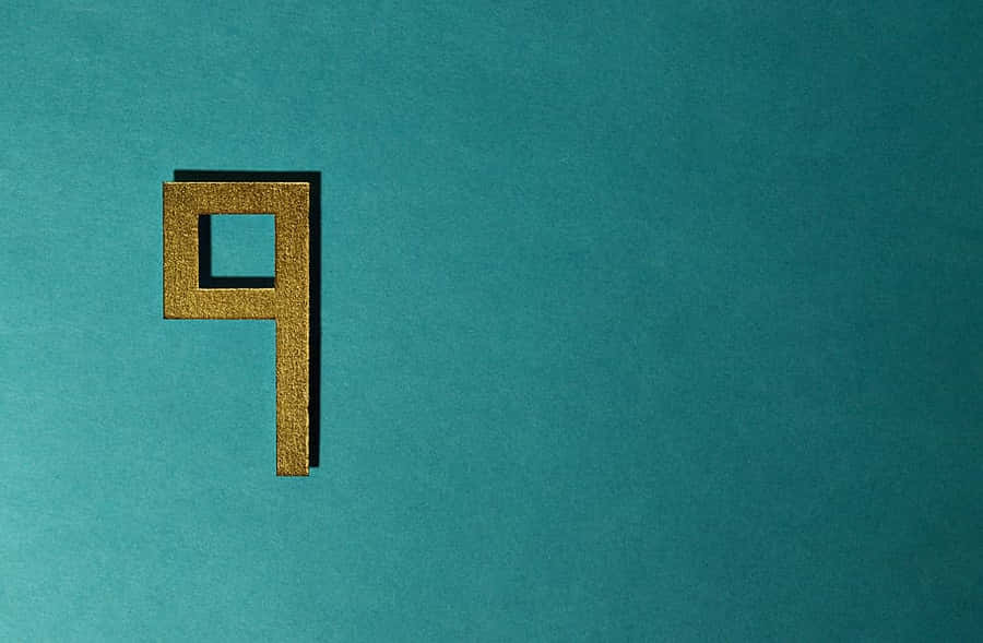 A Gold Letter P On A Turquoise Background Wallpaper