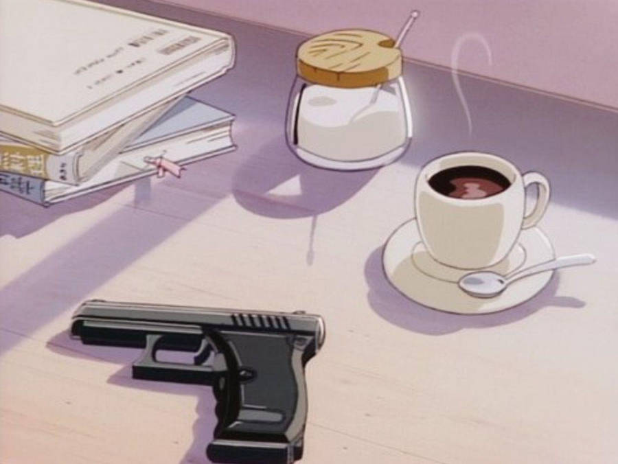 A Gun And Coffee On A Table Wallpaper