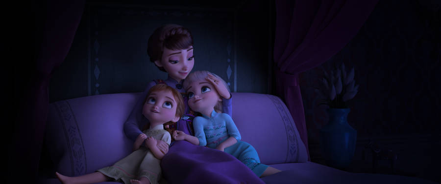 A Heartwarming Moment Between Elsa, Anna, And Their Mother Iduna Wallpaper