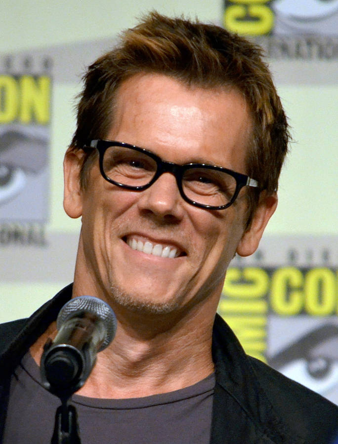 A Jubilant Kevin Bacon At The Comic-con Event. Wallpaper