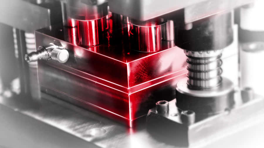 A Machine With Red Lights And A Red Light Wallpaper