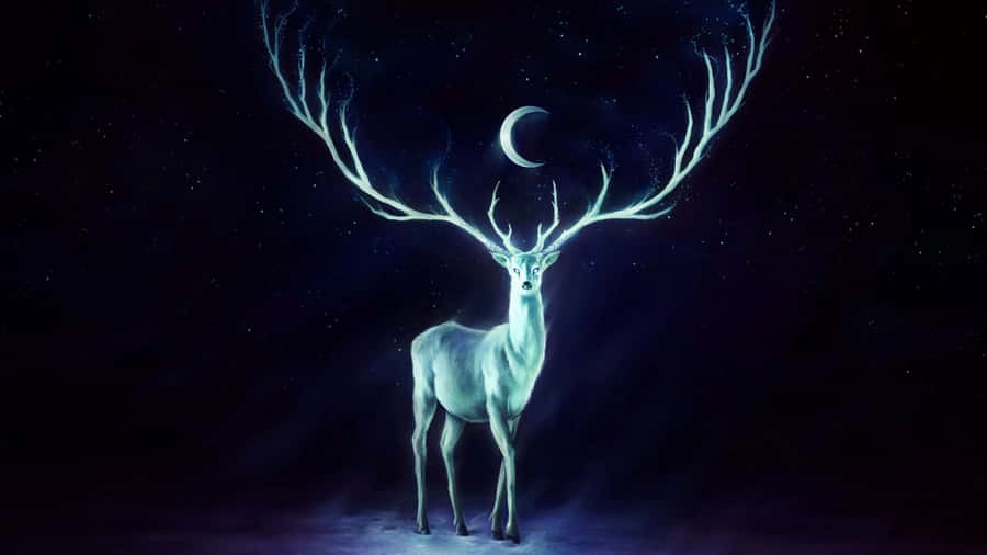 A Majestic Cool Deer Standing In Front Of Glistening Mountains Wallpaper