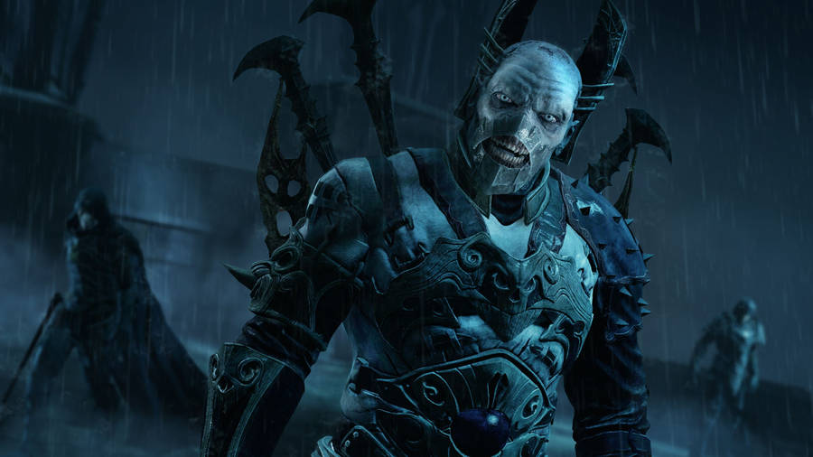 A Man In Armor Is Standing In The Rain Wallpaper