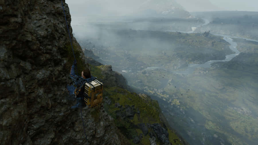 A Man Is Climbing A Cliff In A Video Game Wallpaper