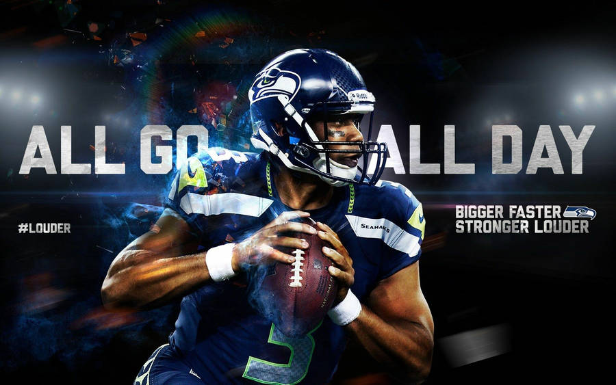 A Man Is Holding A Football With The Words All Go All Day Wallpaper
