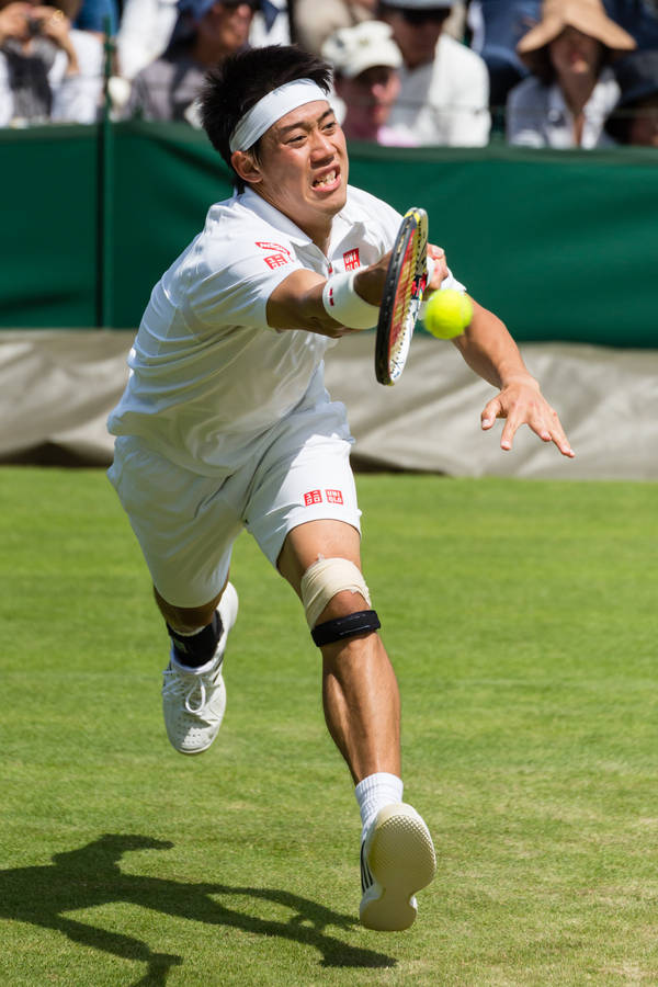 A Man Playing Tennis Wallpaper