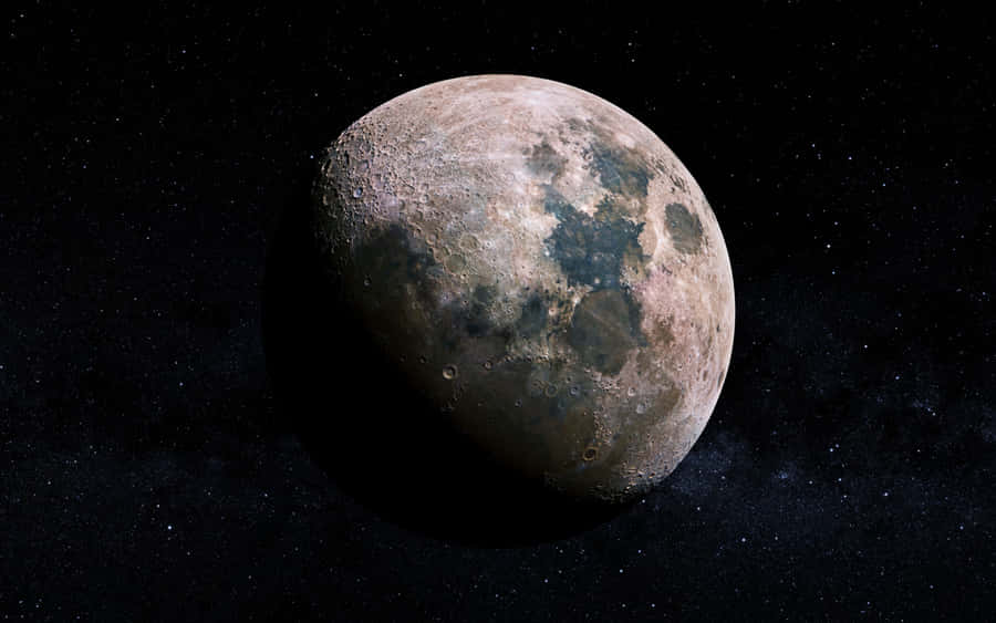 A Mesmerizing Picture Of The Cool Moon Illuminated In The Night Sky. Wallpaper