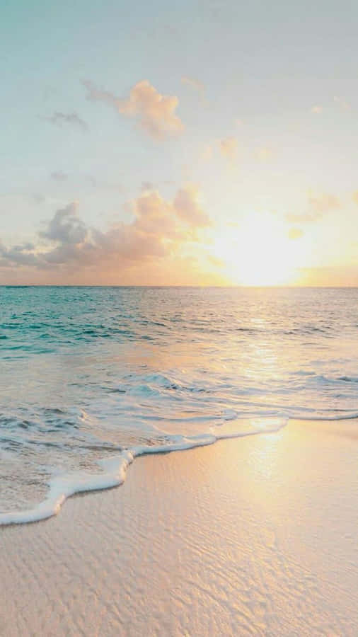 A Picturesque View Of The Ocean Sunset. Wallpaper